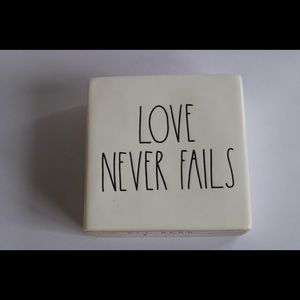 LOVE NEVER FAILS DECOR
